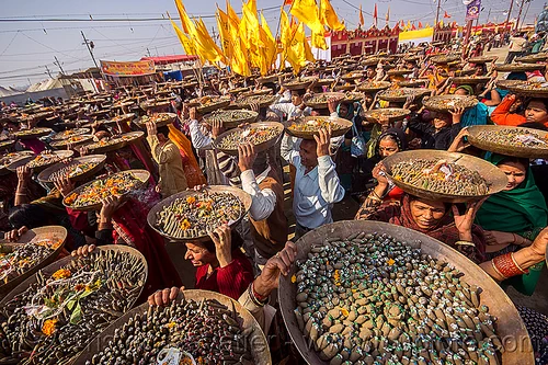clay shiva lingam's offerings - procession - hindu ceremony - kumbh mela (india), carrying on the head, clay, crowd, hindu ceremony, hindu pilgrimage, hinduism, kumbh mela, lingams, offerings, shiva linga, shiva lingam, shivling, trays, walking, yellow flags