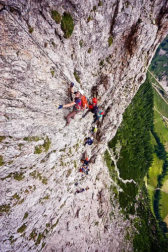 cliff climbing - ascending the via ferrata tridentina - dolomites mountains (italian alps), alps, cliff, climber, climbing harness, climbing helmet, dolomites, dolomiti, ferrata tridentina, mountain climbing, mountaineer, mountaineering, mountains, rock climbing, vertical, via ferrata brigata tridentina, woman