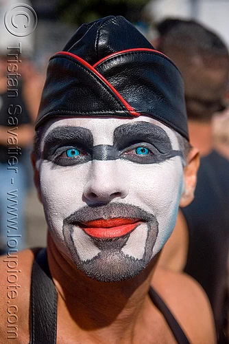 colored contact lenses - very blue eyes, blue contact lenses, blue contacts, chi energy, color contact lenses, face painting, facepaint, leather hat, makeup, man, red lipstick, special effects contact lenses, theatrical contact lenses, white face paint