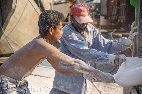dock workers covered in white powder, dock, harbor, men, surabaya