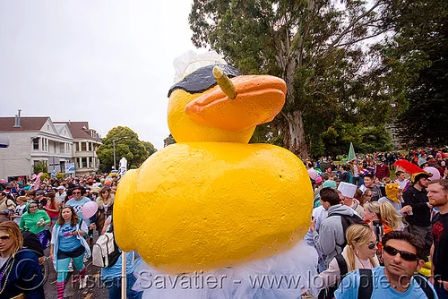ducky float - bay to breaker footrace and street party (san francisco), bay to breakers, carnival float, cigar smoking, costume, crowd, footrace, giant ducky, street party, yellow