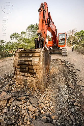 excavator ripping up old asphalt - doosan dx225lc (india), alphalt, asphalt removal, at work, bucket attachment, demolition, doosan excavator, dx225lc, excavator bucket, old asphalt, old bitumen, old macadam, pavement, ripping up, road construction, roadwork, scraping off, west bengal, working
