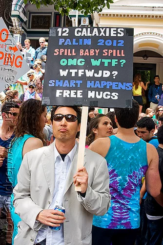 frank chu impersonator, 12 galaxies, bay to breakers, costume, crowd, footrace, frank chu impersonator, man, picket sign, protester, protesting, street party, sunglasses