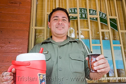 gendarme drinking mate (argentina), andean carnival, argentina, carnaval de la quebrada, cop, gendarme, gendarmería nacional, gna, jujuy capital, law enforcement, man, noroeste argentino, police, porongo, san salvador de jujuy, uniform, yerba mate