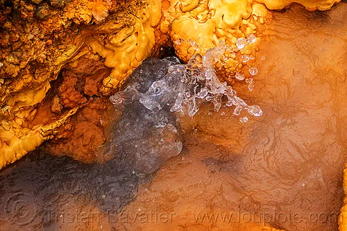 geyser of scalding water at sulfurous hot springs (india), bubbling, concretion, dhauliganga valley, droplets, geyser, hot water, mountains, orange, sulfurous hot springs, tapovan hot springs