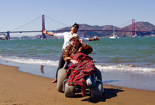 grandma and granddaughter at san francisco beach - wheelchair, beach wheelchair, blanket, chinese woman, crissy field beach, family, golden gate bridge, grandma, grandmother, jenn, ocean, old woman, sand, sea, senior, straw hat, suspension bridge, women