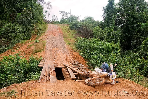 honda xr 250 - motorcycle accident on broken bridge (laos), 250cc, bridge, broken, crash, dirt road, dropped, dual-sport, honda motorcycle, honda xr 250, laying down, mishap, motorcycle accident, motorcycle touring, traffic accident, unpaved
