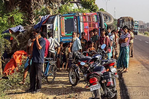 indian villagers around overturned truck (india), crash, crowd, lorry accident, motorcycles, overturned truck, road, rollover, tata motors, traffic accident, truck accident, truck driver, wreck