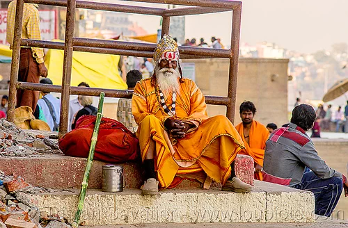 old sadhu sitting on a ghat - varanasi (india), baba, bhagwa, ghats, hat, headdress, hindu, hinduism, man, necklace, sadhu, saffron color, sitting, tilak, tilaka, varanasi, white beard