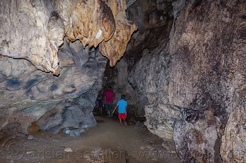 people venturing in natural cave, tana toraja