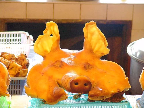 pig head - thailand, cooked meat, hears, meat market, meat shop, orange, pig head, pork, snout, transluscent