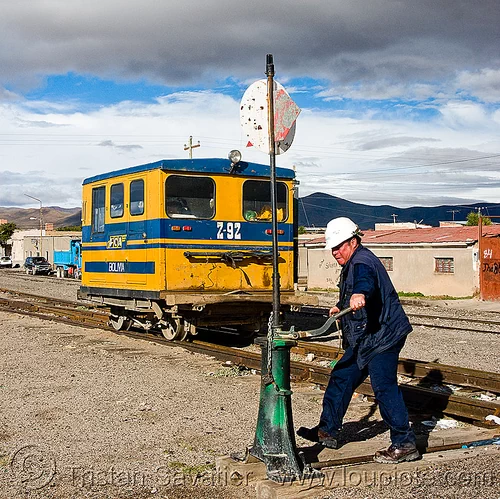 railroad worker maneuvering switch - speeder - uyuni (bolivia), bolivia, draisine, enfe, fca, man, railroad tracks, railway tracks, speeder, train, uyuni, worker, working, z-92
