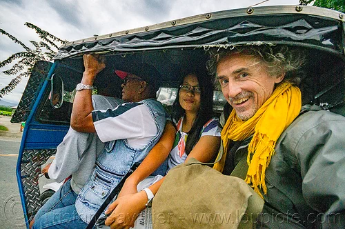 riding an overloaded motorized tricycle (philippines), man, motorcycle, motorized tricycle, passengers, self portrait, selfie, sidecar, sitting