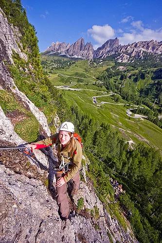 rock climbing in the dolomites - via ferrata tridentina, alps, cliff, climber, climbing harness, climbing helmet, dolomites, dolomiti, ferrata tridentina, mountain climbing, mountaineer, mountaineering, mountains, rock climbing, vertical, via ferrata brigata tridentina, woman