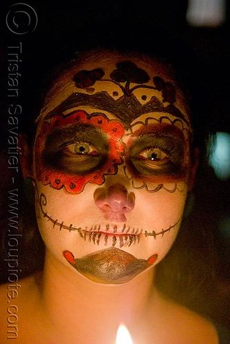 skull makeup - green eyes - dia de los muertos - halloween (san francisco), candle, day of the dead, dia de los muertos, face painting, facepaint, halloween, night, sugar skull makeup, woman