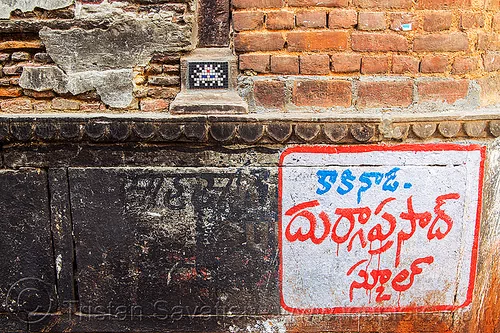 space invaders mosaic (varanasi), brick wall, bricks, invader, mosaic, space invaders, street art, tilak, tilaka, urban art, varanasi