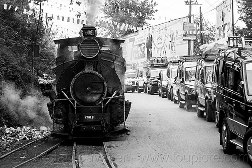 steam locomotive sharing road with cars - darjeeling (india), 788 tusker, cars, darjeeling himalayan railway, darjeeling toy train, man, narrow gauge, operator, railroad tracks, road, smoke, smoking, steam engine, steam locomotive, steam train engine, traffic jam, worker