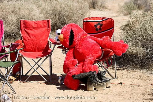 stuffed red elmo, elmo, puppet