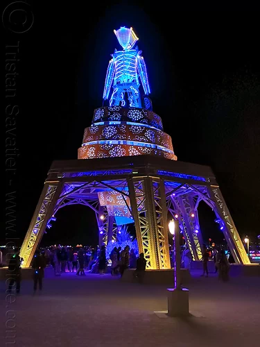 the burning man at night, burning man at night, glowing, neon, the man