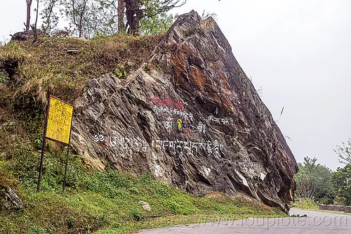 tibetan writing painted on cliff - sikkim (india), road sign, rock, sikkim, tibetan