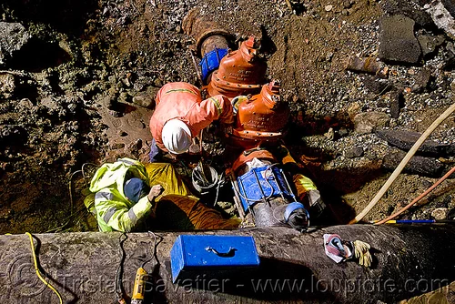 water main pipeline cut-off valves - utility workers fixing broken water main (san francisco), awwa c515, construction workers, cut-off valves, gate valves, hetch hetchy water system, high-visibility vest, night, reflective vest, repairing, resilient, safety vest, sfpuc, sink hole, utility crew, utility workers, water department, water main, water pipe, working