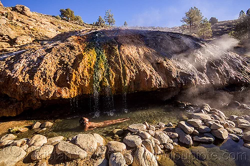 woman bathing in buckeye hot springs (california), bath, bathing, buckeye hot springs, california, concretions, dripping, eastern sierra, nude, pool, rocks, smoke, smoking, steam, travertine, woman