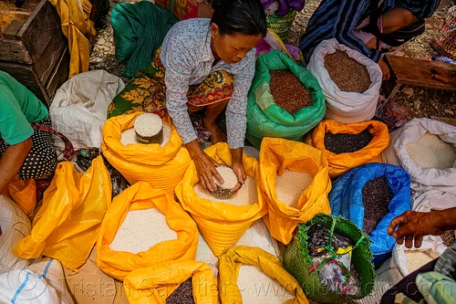 woman selling rice - rice stand on street market, bolu market, pasar bolu, rantepao, rice bags, rice merchant, rice shop, seller, sitting, tana toraja, vendor, woman
