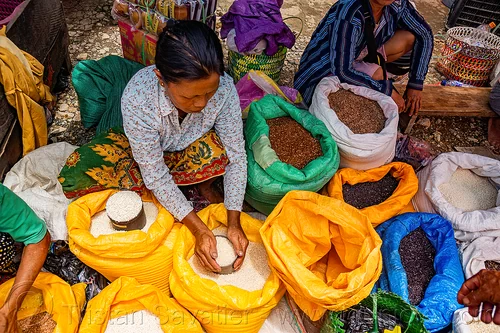 woman selling rice - rice stand on street market, bolu market, pasar bolu, rantepao, rice bags, rice merchant, rice shop, seller, sitting, tana toraja, vendor, woman