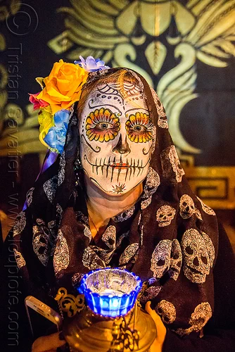 woman with sugar skull makeup - kara - dia de los muertos, black veil, blue, candle, day of the dead, dia de los muertos, face painting, facepaint, flower headdress, flowers, halloween, mural, night, orange rose flower, skulls pattern, sugar skull makeup, woman