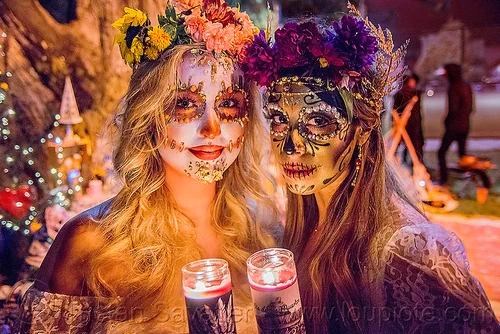 women with beautiful sugar skull makeup - dia de los muertos, andrea, bindis, candle light, candles, day of the dead, dia de los muertos, face painting, facepaint, flower headdress, flowers, halloween, mariana, night, sugar skull makeup, women
