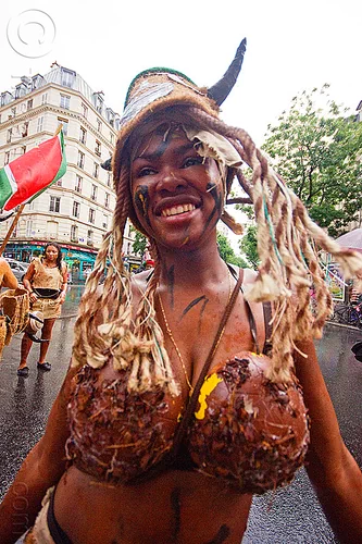 young caribbean woman wearing coconut bra - choukaj - carnaval tropical (paris), caribbean, carnaval tropical, choukaj, coconut bra, costumes, creole, créole, dancing, guadeloupe, hat, indigenous culture, parade, traditional, tribal, west indies, woman