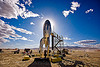 the raygun gothic rocket - burning man 2009, art installation, backlight, burning man, clouds, launch pad, raygun gothic rocket, raygun rocket, space ship